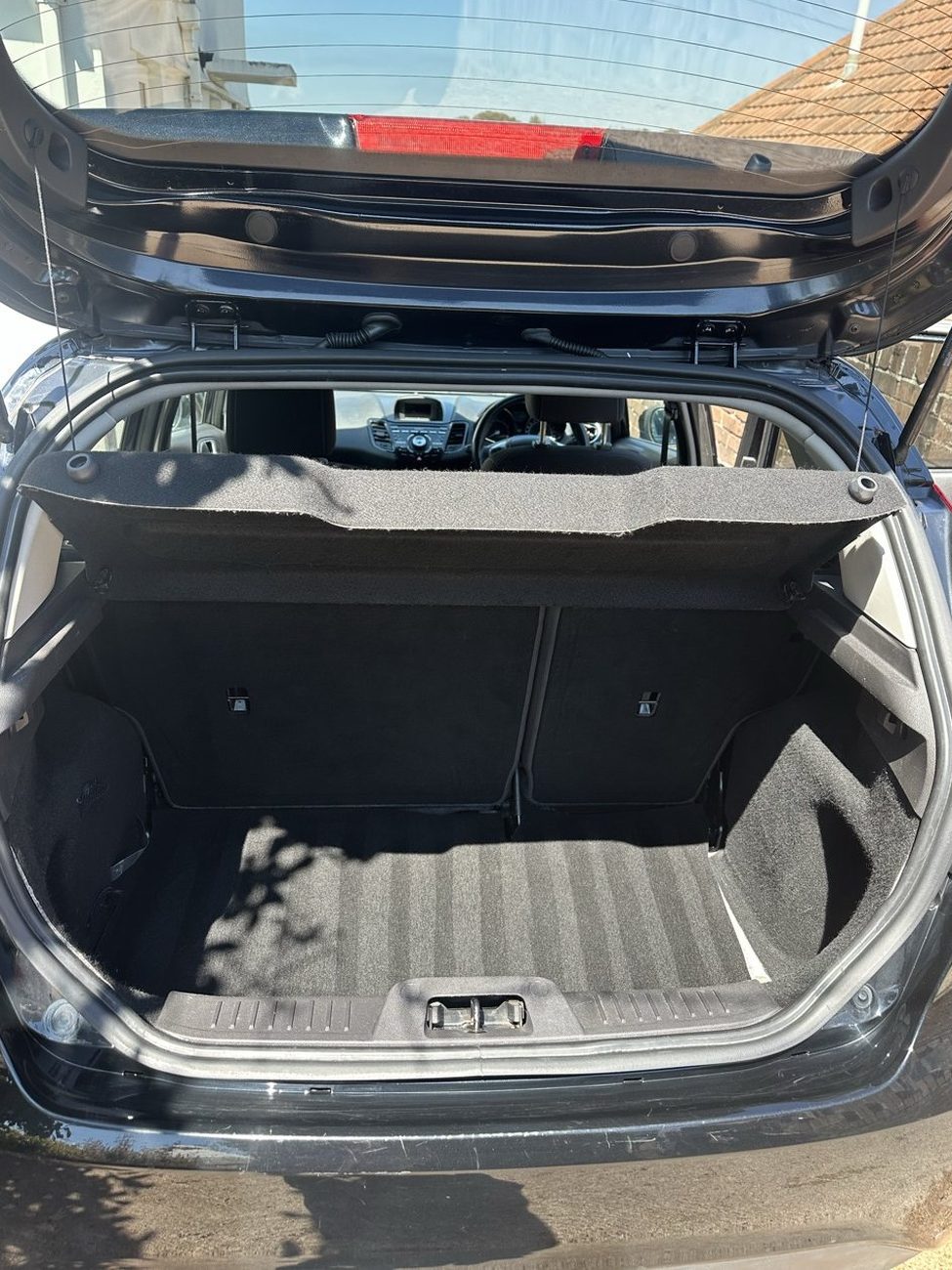 Black Ford Fiesta boot after clearing and vacuuming