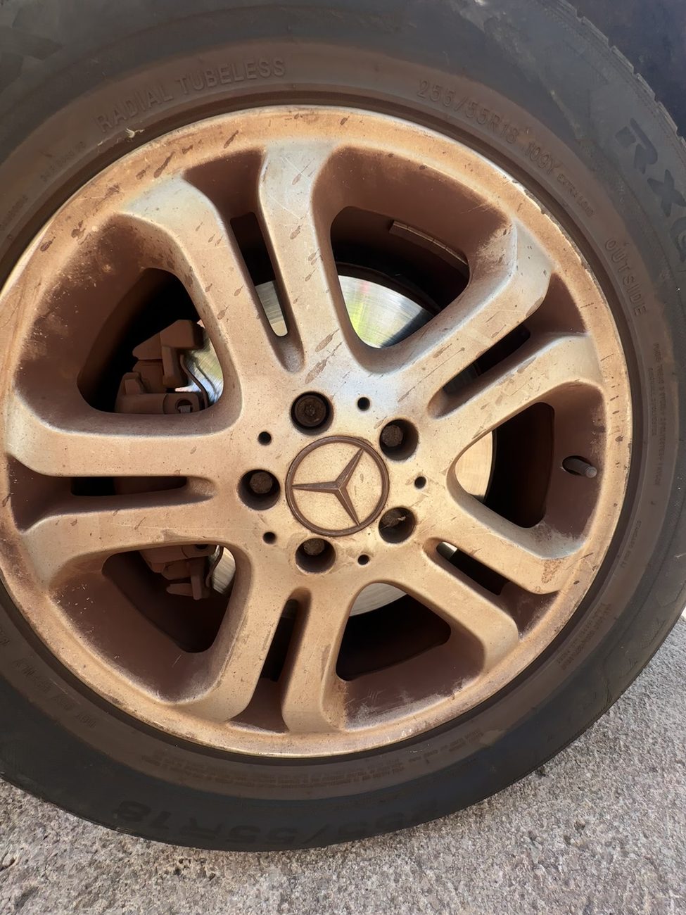 Mercedes alloy wheel covered in brake dust before cleaning