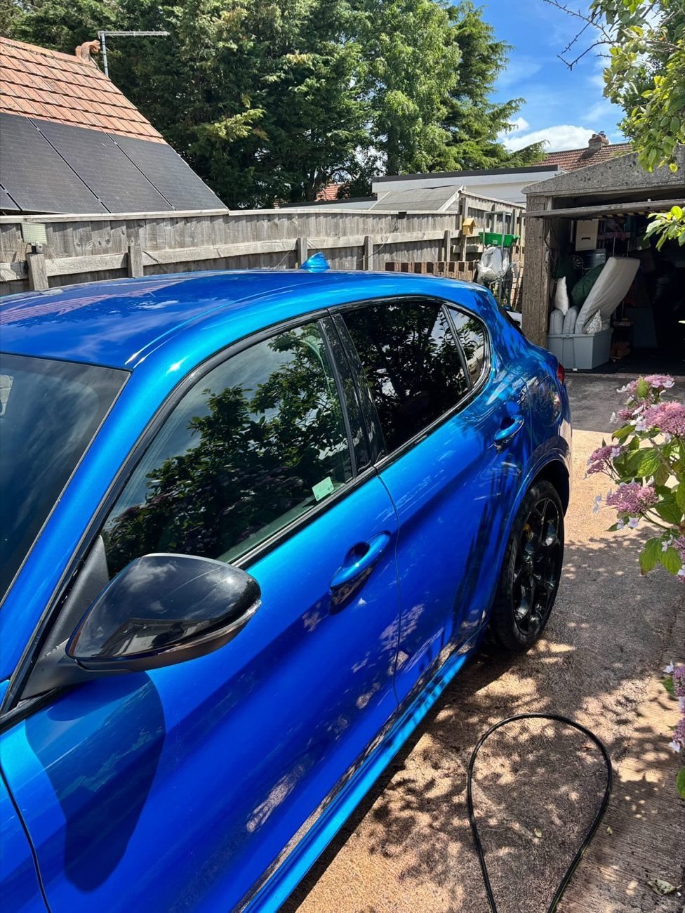 Blue Peugeot 2008 with a deep metallic gloss down the side