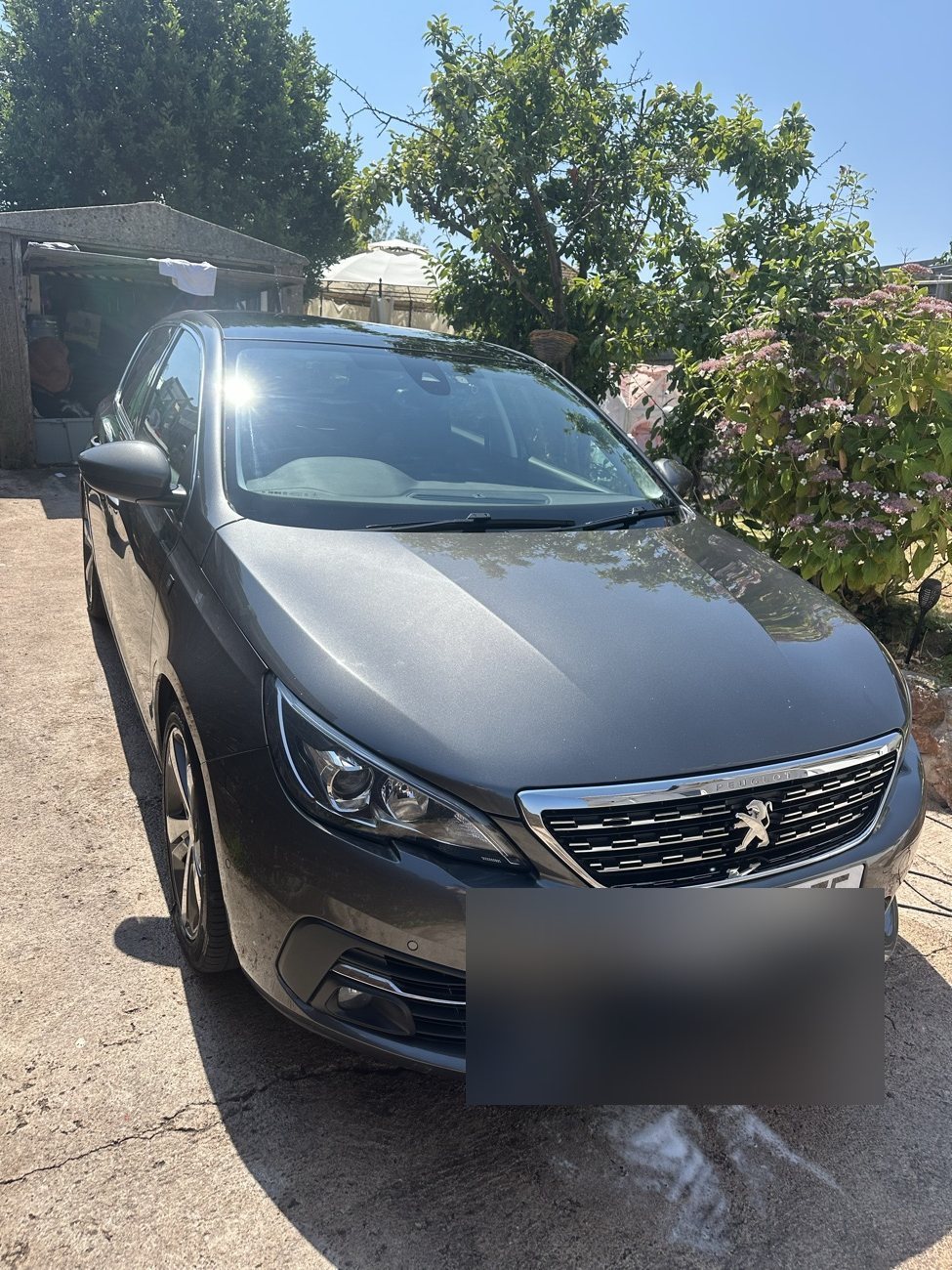 Freshly detailed grey Peugeot 308 with a showroom finish by T&B Detailing